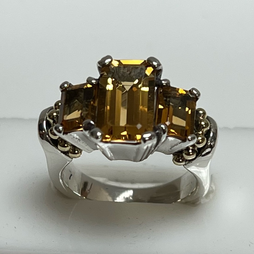 NWOT Lagos Caviar ring with three emerald cut citrine stones.
